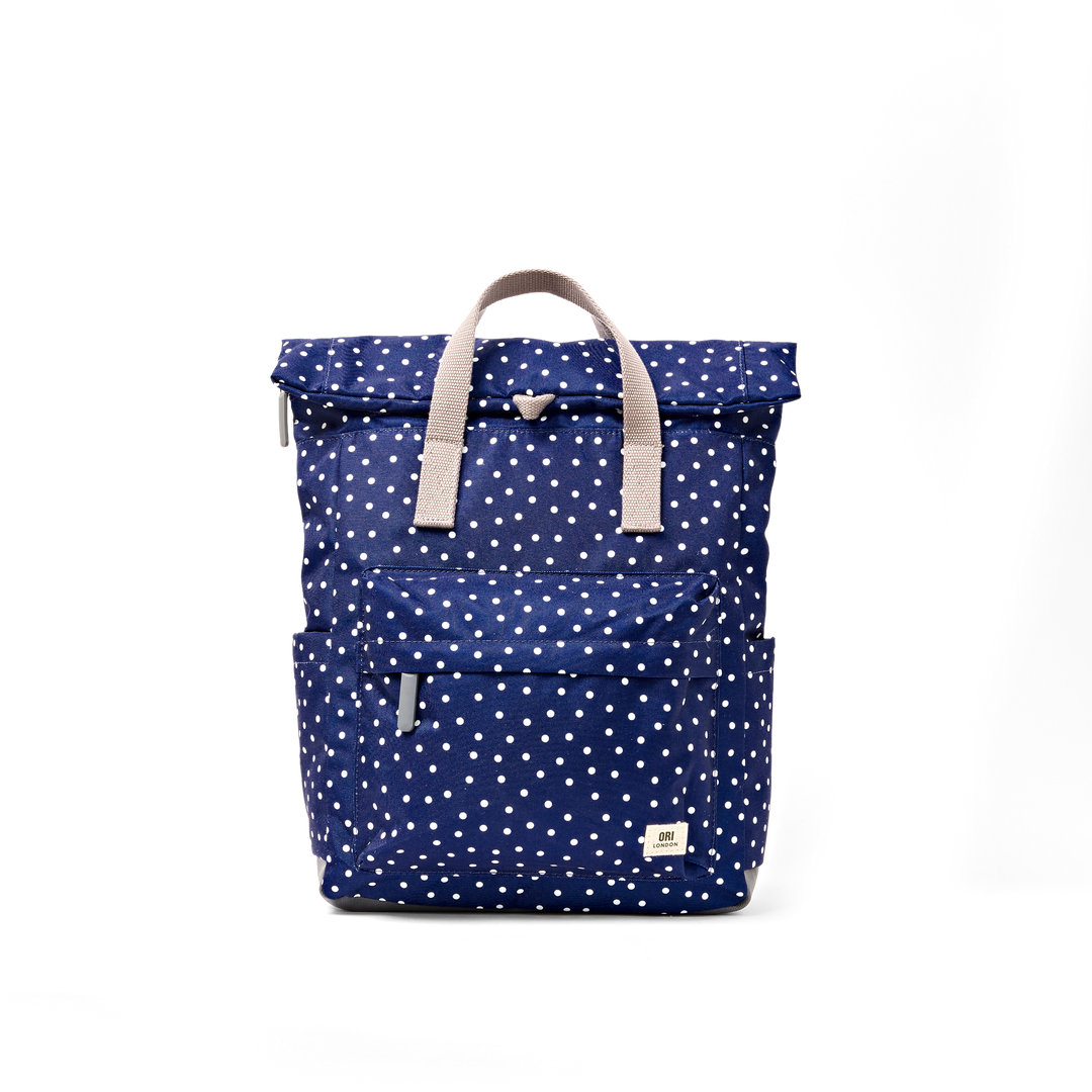 Canfield Roll Top Backpack in Navy Polka Dot