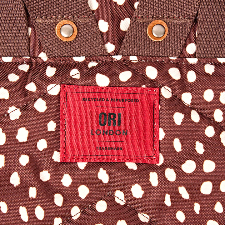 Canfield Roll Top Backpack in Brown Dot