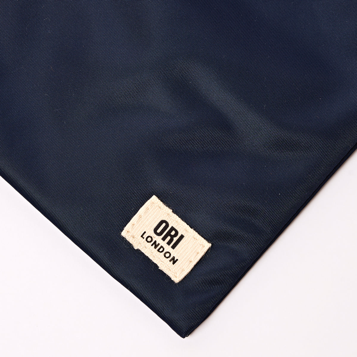 Chelsea Pocket Sling Bag in Midnight Stripe