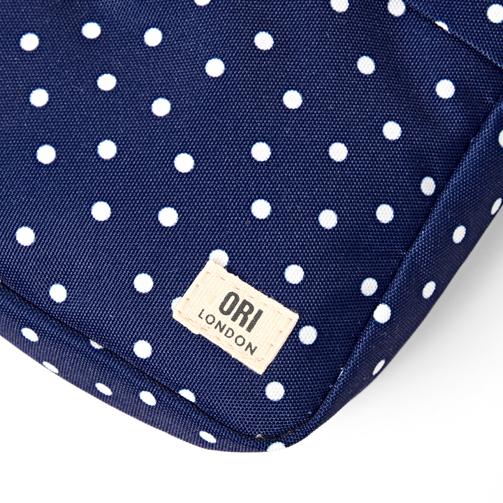 Bond Pocket Crossbody Bag in Navy Polka Dot