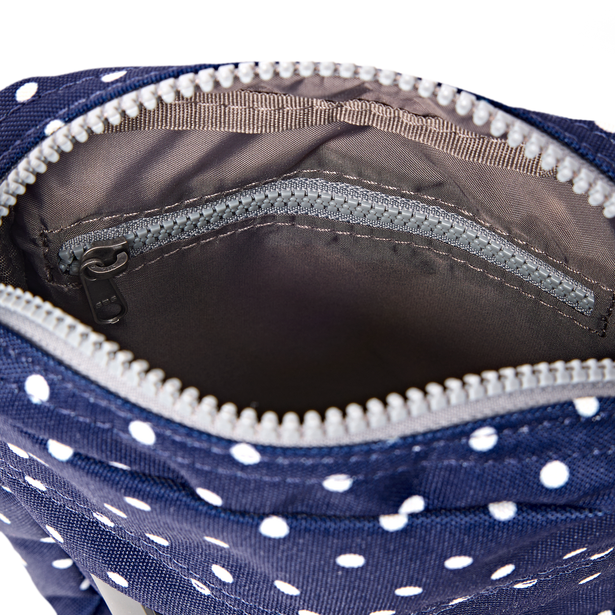 Bond Pocket Crossbody Bag in Navy Polka Dot