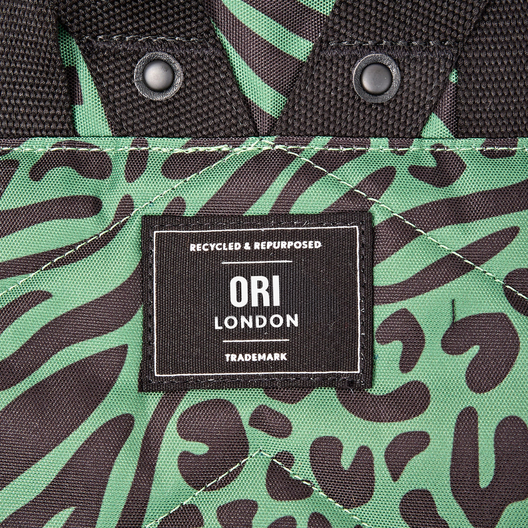 Canfield Roll Top Backpack in Mixed Animal Artichoke
