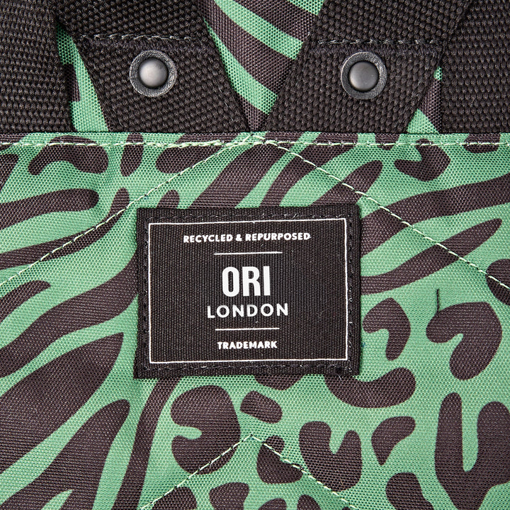 Canfield Roll Top Backpack in Mixed Animal Artichoke