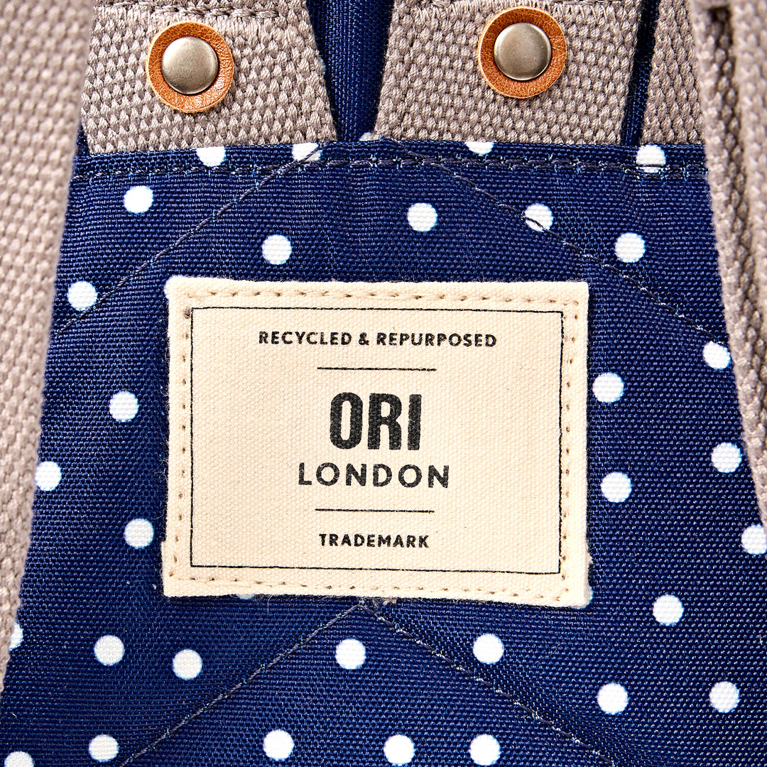 Canfield Roll Top Backpack in Navy Polka Dot
