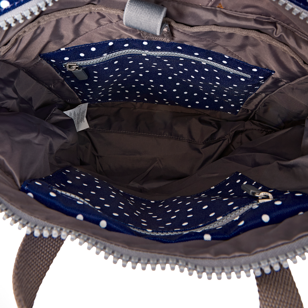 Canfield Roll Top Backpack in Navy Polka Dot