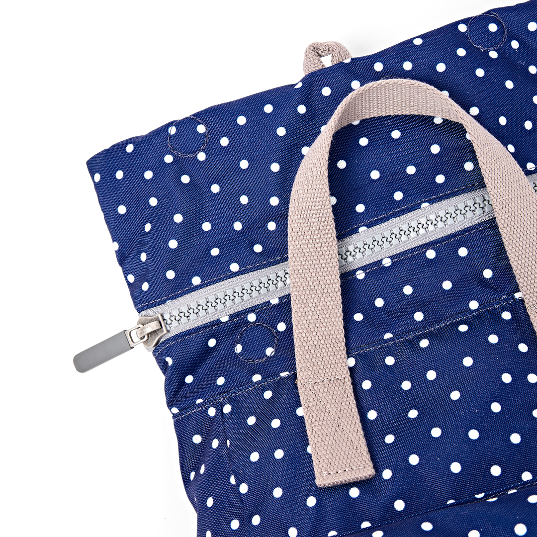 Canfield Roll Top Backpack in Navy Polka Dot