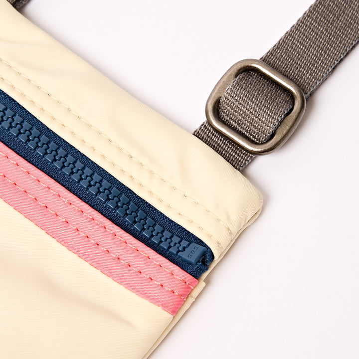 Chelsea Pocket Sling Bag in Wax Paper Stripe