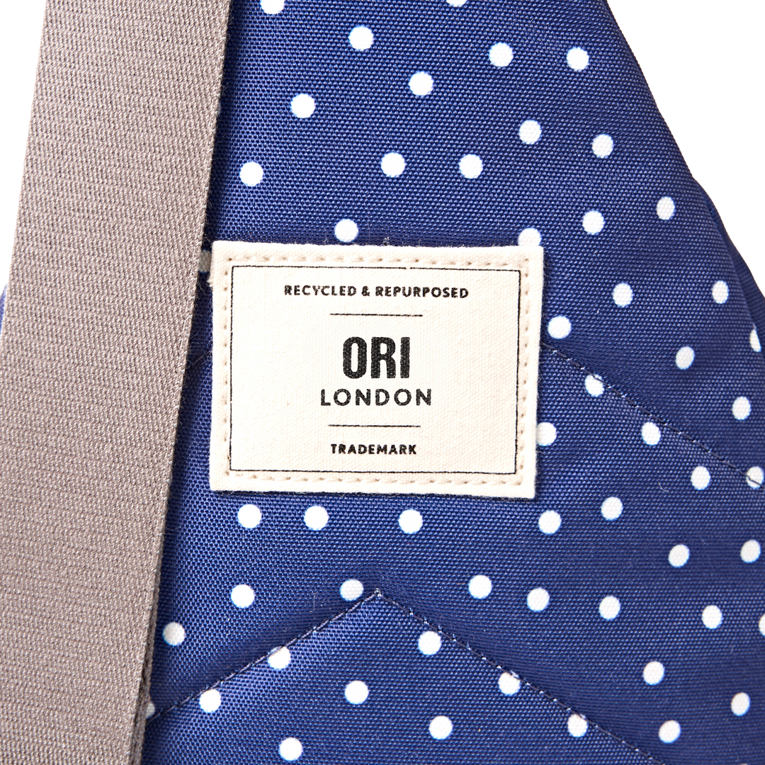 Willesden Sling Bag in Navy Polka Dot