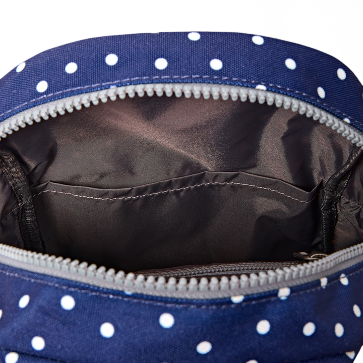Willesden Sling Bag in Navy Polka Dot