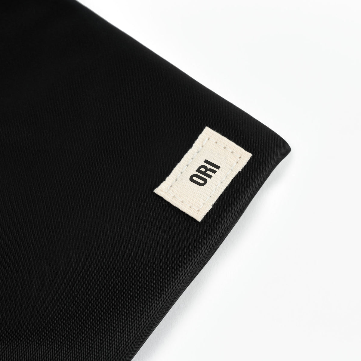 Chelsea Pocket Sling Bag in Black