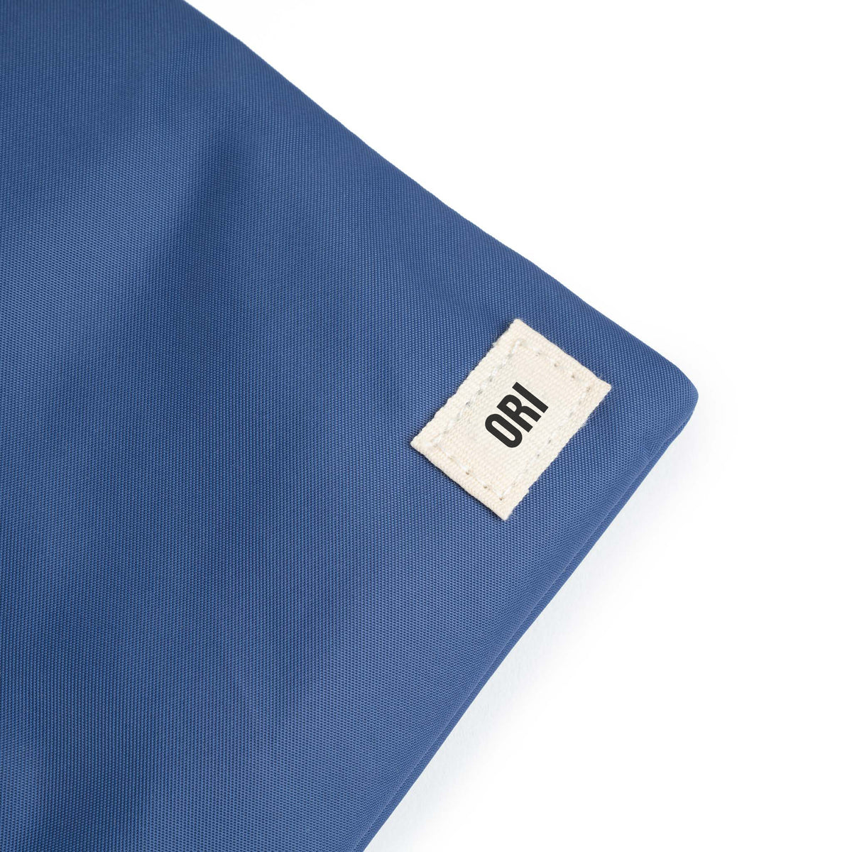 Chelsea Pocket Sling Bag in Burnt Blue