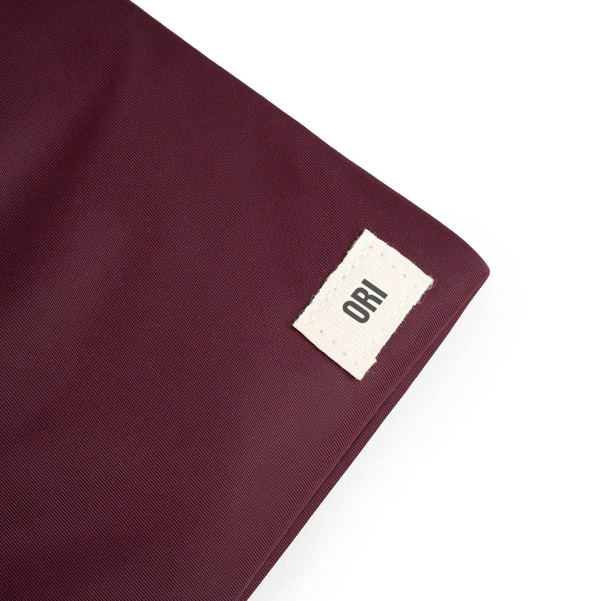 Chelsea Pocket Sling Bag in Plum