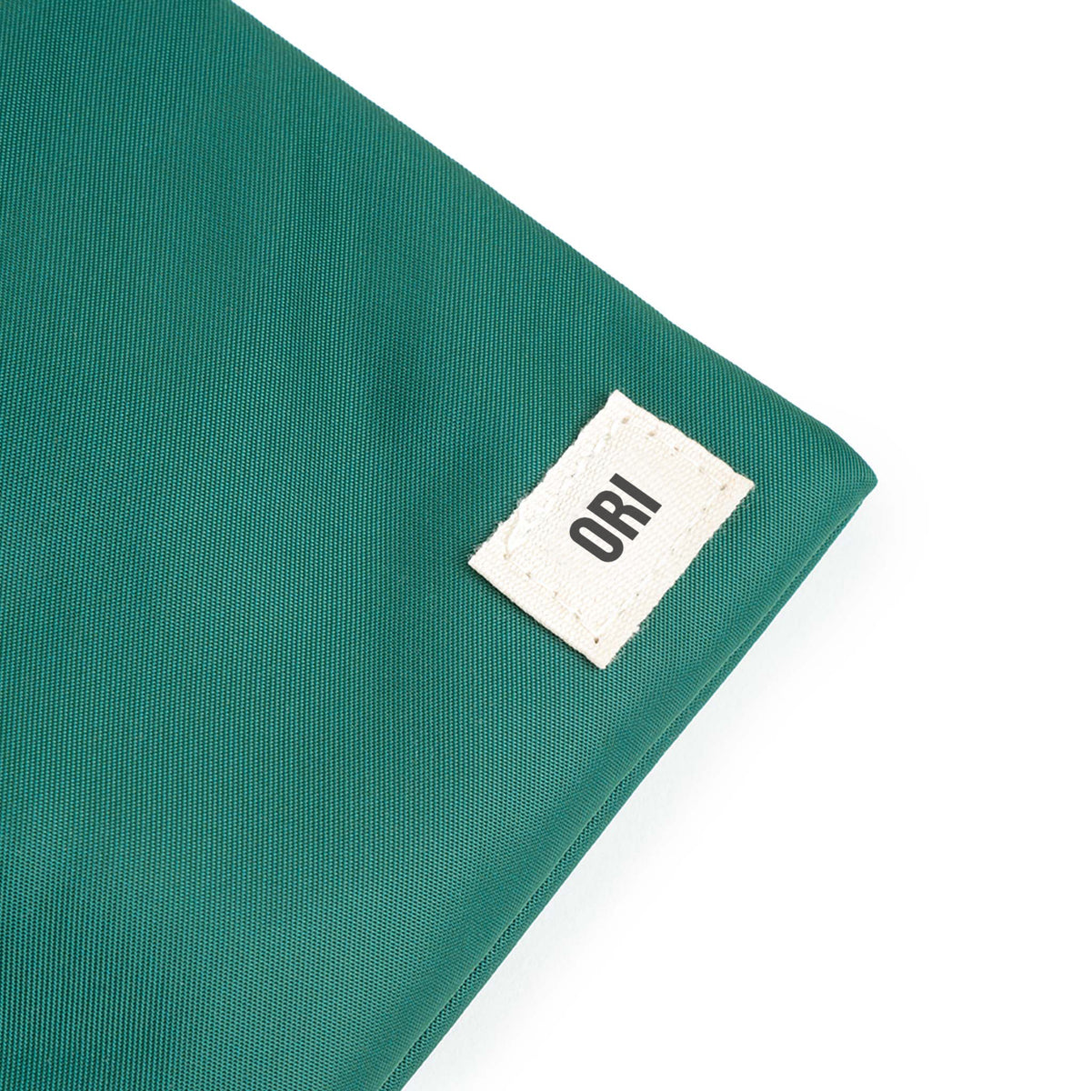 Chelsea Pocket Sling Bag in Teal